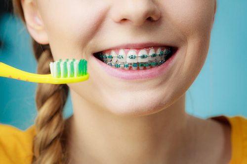 How to Brush Your Teeth with Braces - Duff Family Dental